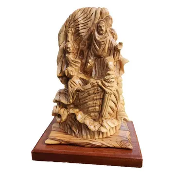 Large carved scene on wooden base
