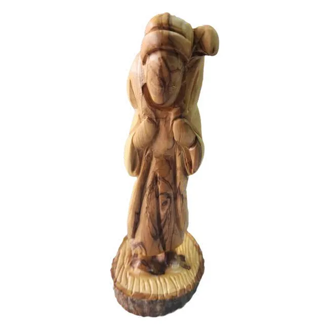 Figure on natural wood base