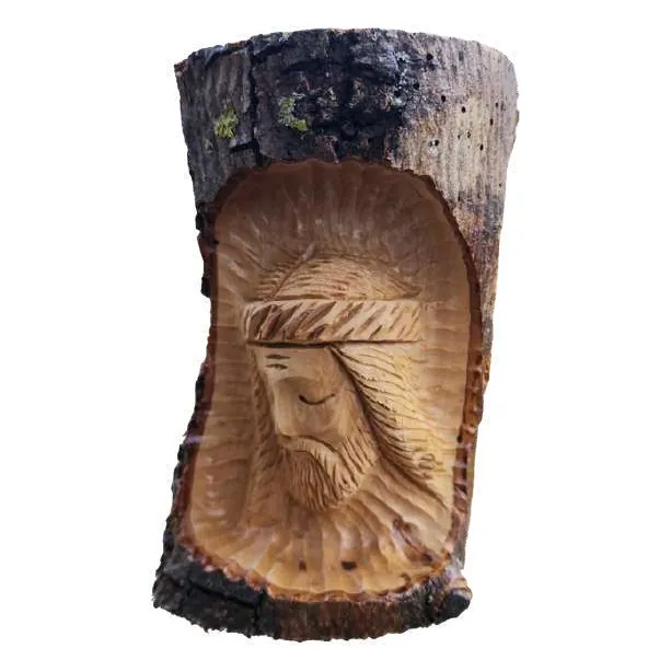 Face of Jesus carved in olive bark
