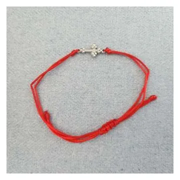 Red string bracelet with cross