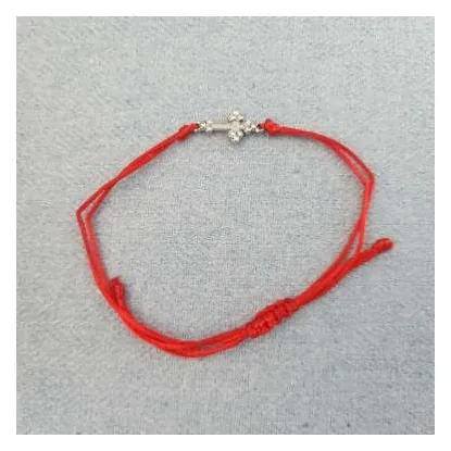 Red string bracelet with cross